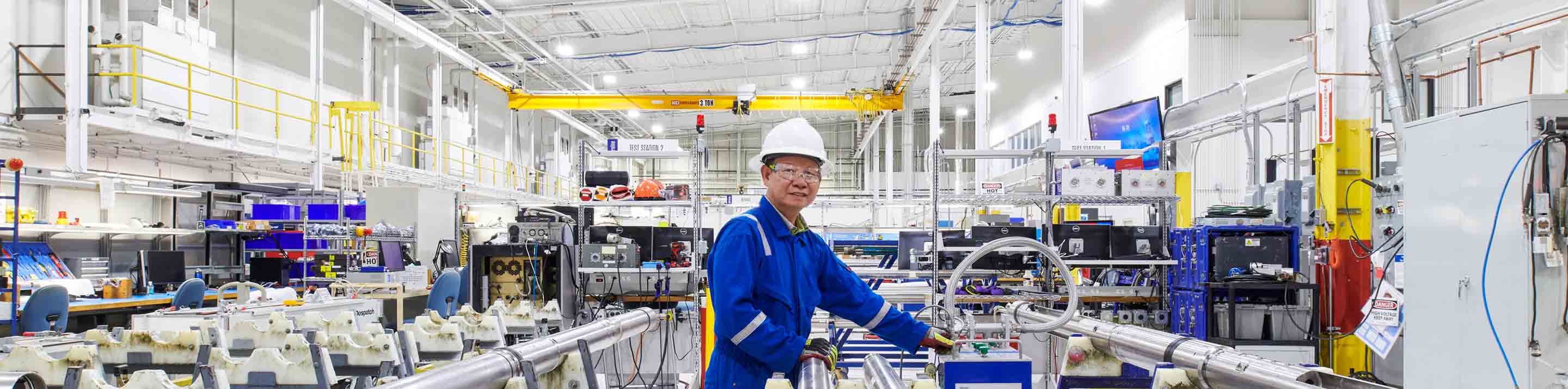 Employee in a Manufacturing Facility. Sugar Land, Texas (Tier 1_ManufacturingFacility_Sugar Land_AML_5396)
